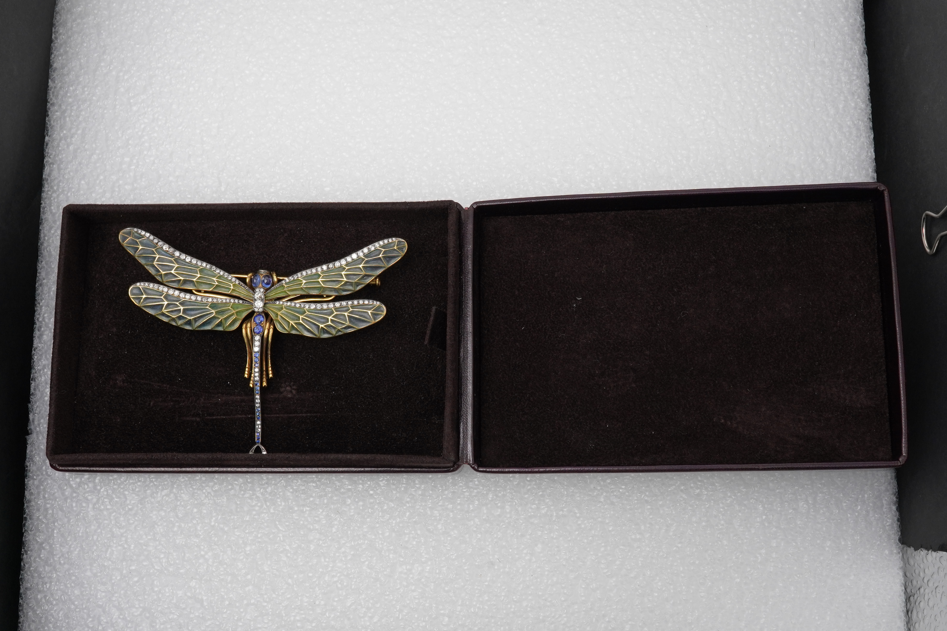 An enamel, sapphire and diamond dragonfly brooch